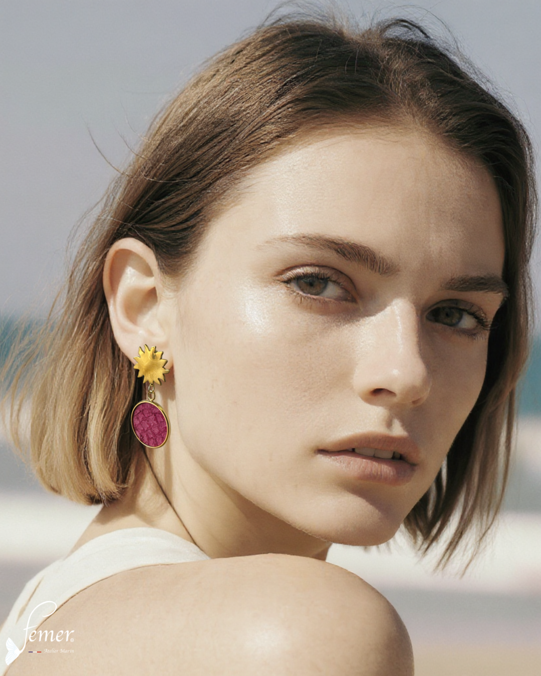 Boucles d'oreilles modèle Soledad soleil inox et cuir marin